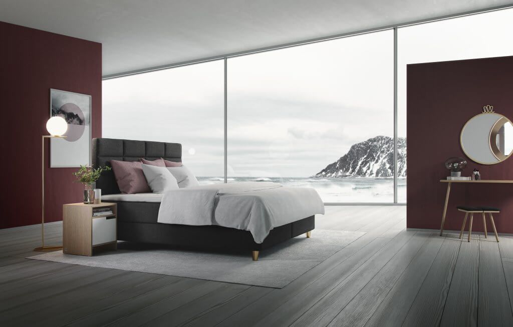 Boxspringbett im Schlafzimmer.